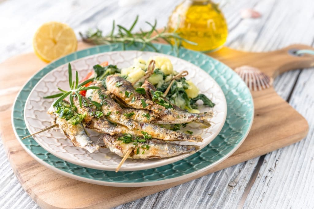 Healthy sardines with potatoes and chard