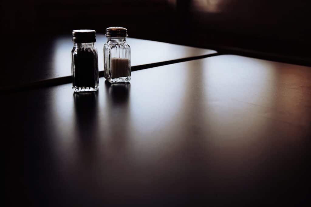 salt and pepper on a table